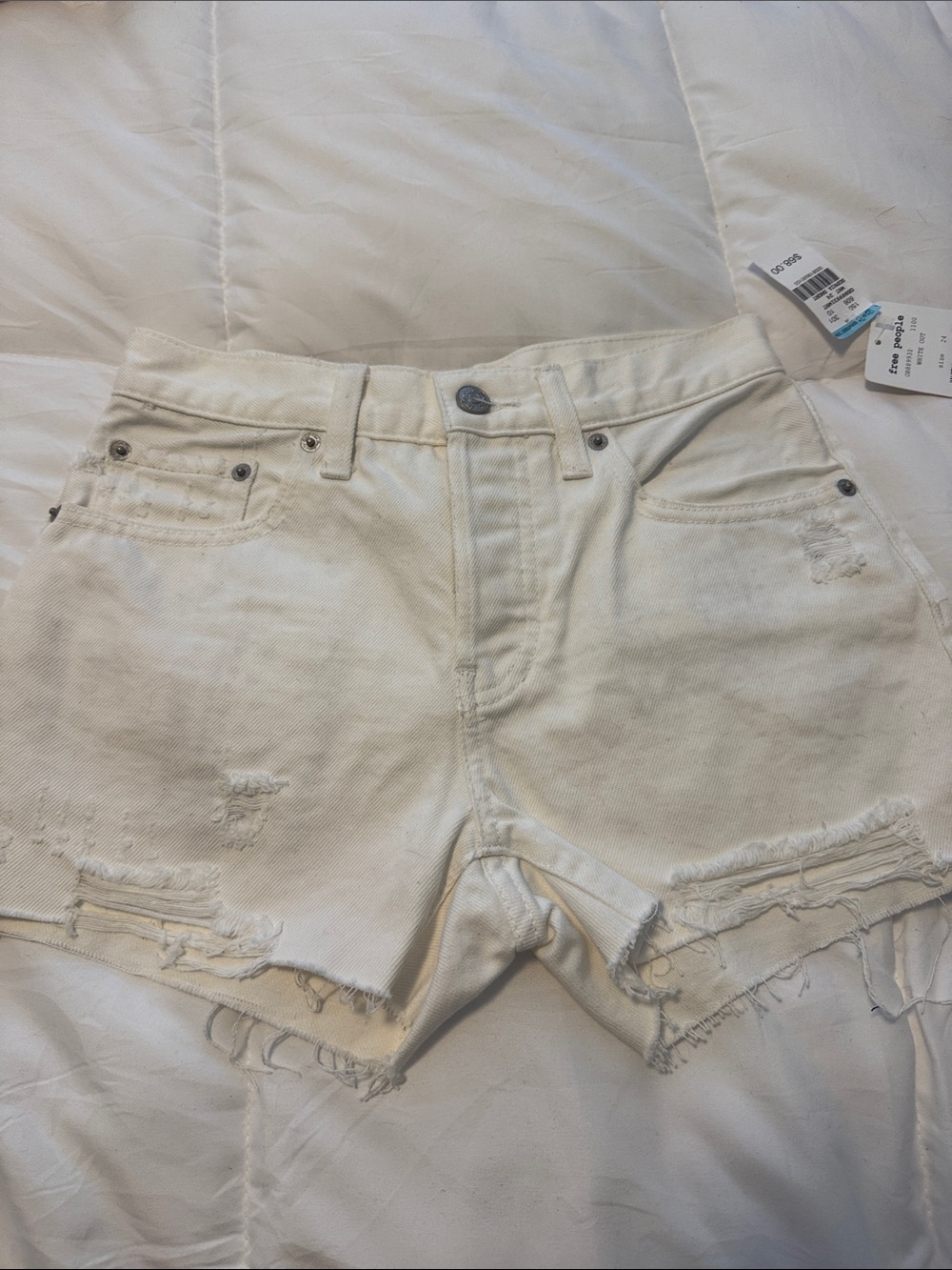 We The Free White Distressed Denim Cutoff Shorts